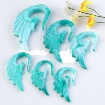 1 Expander / Flügel Resin türkis  im Organza Beutel
