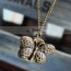 Kette mit vintagen Uhr Schmetterling im weißen Organza Beutel